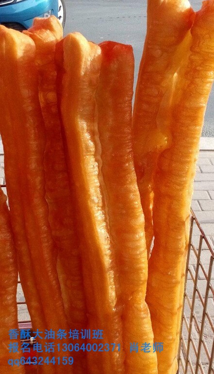 山東無(wú)礬油條加盟培訓(xùn)學(xué)習(xí)炸油條配方做法_1