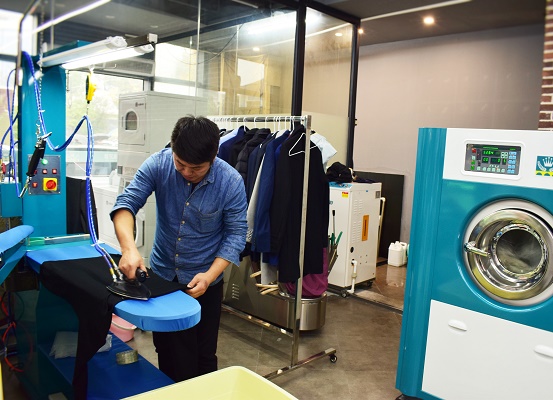 我想開家干洗加盟店要多少錢？_1