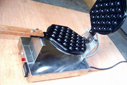 特色雞蛋仔的制作方法是什么（圖）_3